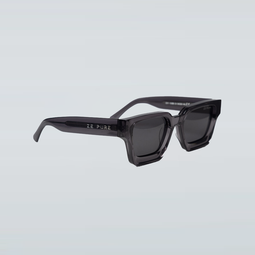 Black sunglasses with 'ZE PURE' branding on a light gray background